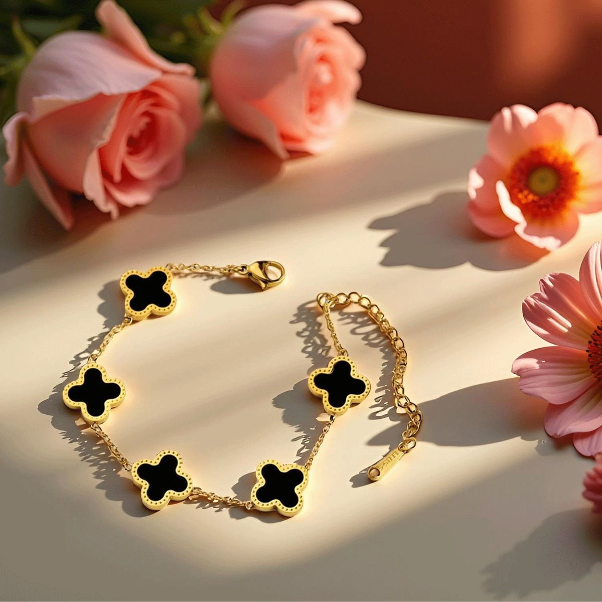 Adjustable black clover bracelet, chic and elegant wrist accessory.