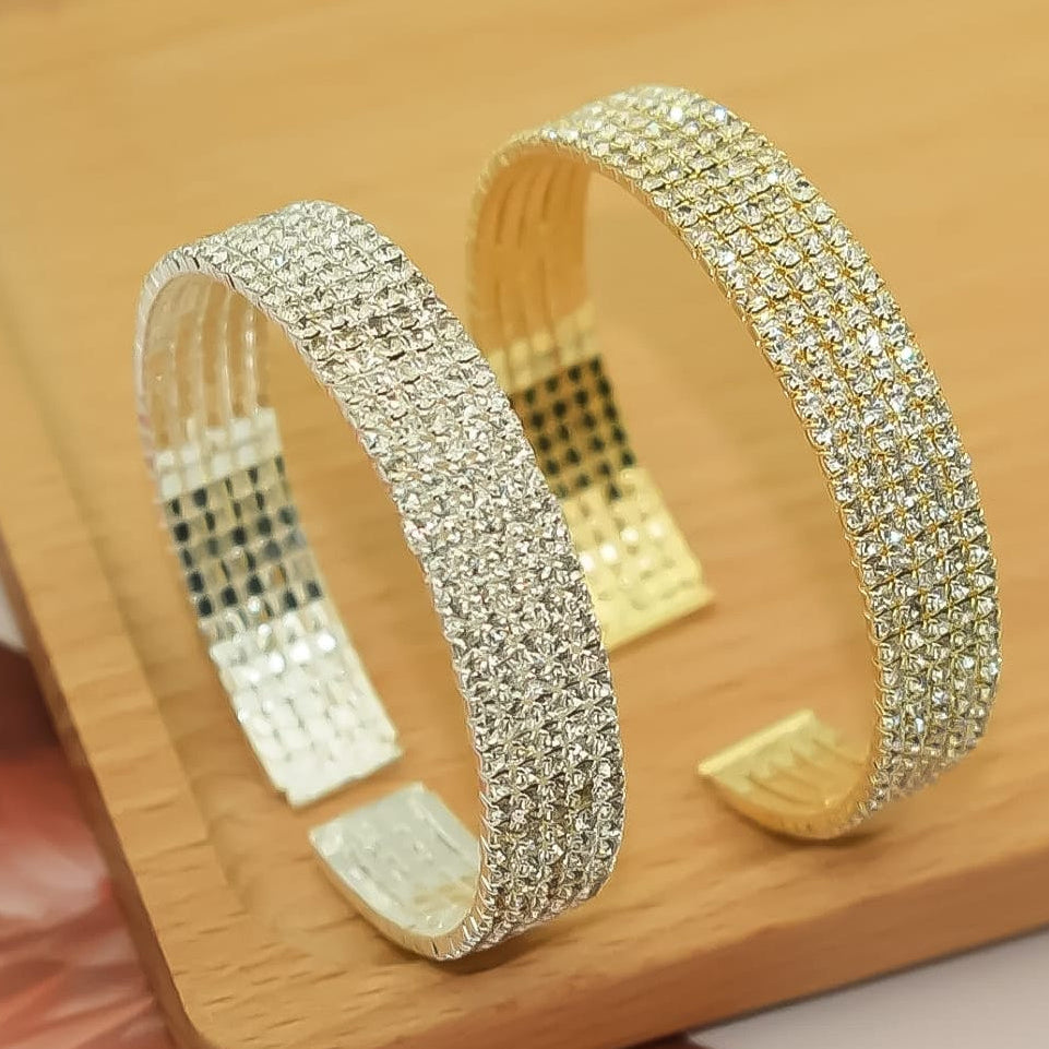 “Sparkling gold and silver cuff bracelet pair – high-shine stainless steel jewelry”