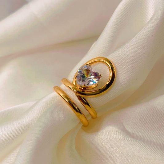 Elegant gold-plated ring featuring a sparkling heart-shaped stone
