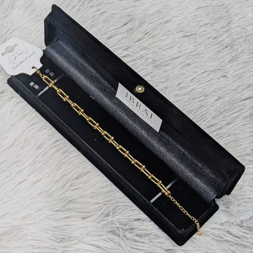 Gold chain bracelet packaged in elegant box