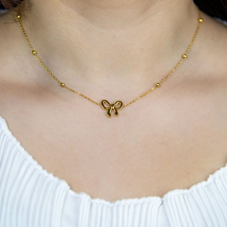 Minimalist stainless steel bow pendant necklace – waterproof and tarnish free