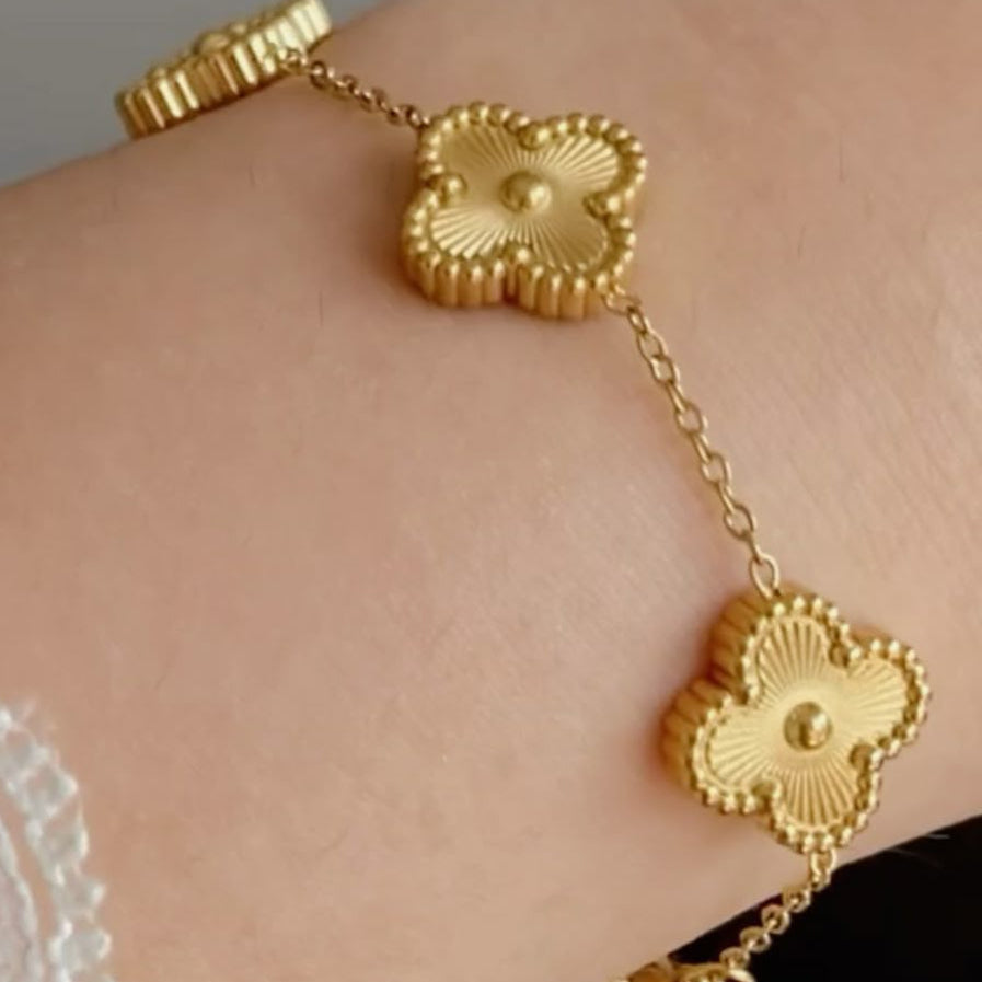 Trendy Golden clover charm bracelet for everyday wear