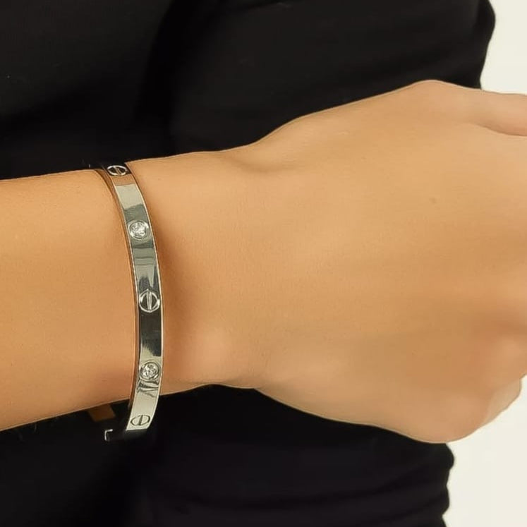 Cartier inspired silver and gold handcuff bracelet set, luxury fashion jewelry.