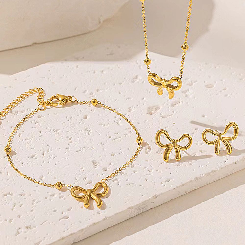 Bow set necklace pendant and tops