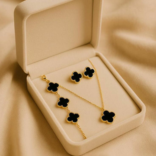 Elegant black enamel clover jewelry set for women with gold detailing