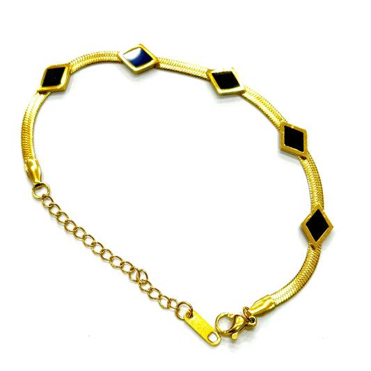 Luxury gold bracelet with black enamel diamond charms – elegant everyday wear accessory