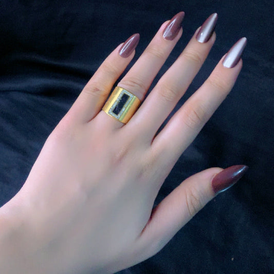 Rectangular black stone gold ring – bold modern luxury accessory