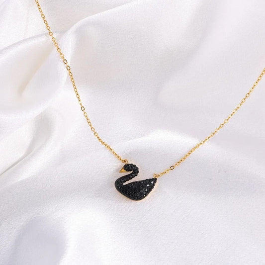 Luxury black and gold swan necklace – elegant pendant for everyday and formal outfits