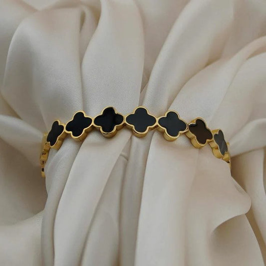 Black clover gold bracelet with enamel clover motifs