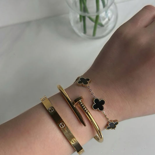 Elegant Cartier cuff and screw nail with golden clover bracelet set, premium non-tarnish finish.