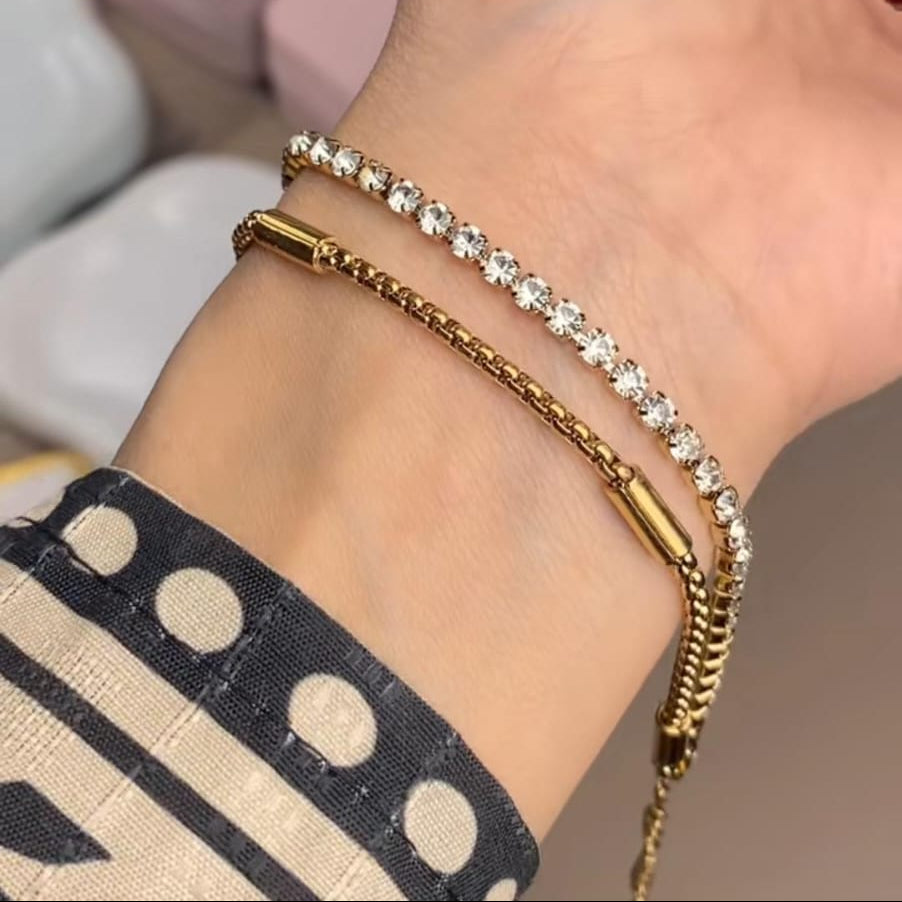 Gold crystal chain waterproof bracelet worn on wrist with elegant minimal design