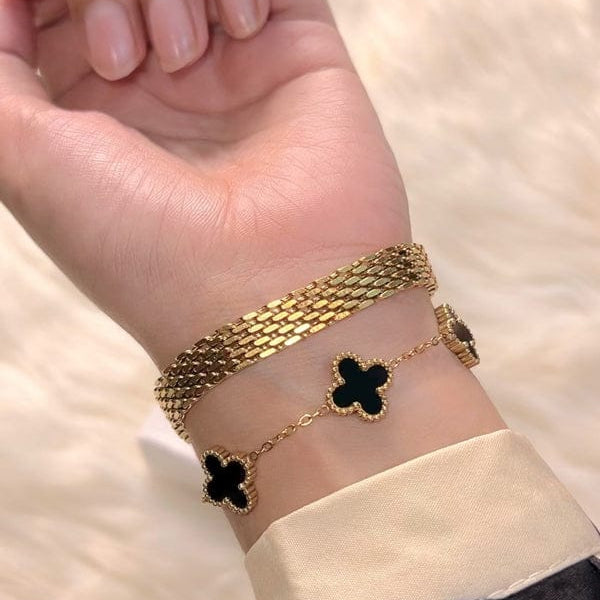 18K gold plated women’s bracelet set featuring black enamel clover design