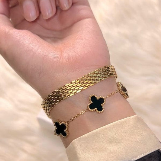 18K gold plated women’s bracelet set featuring black enamel clover design