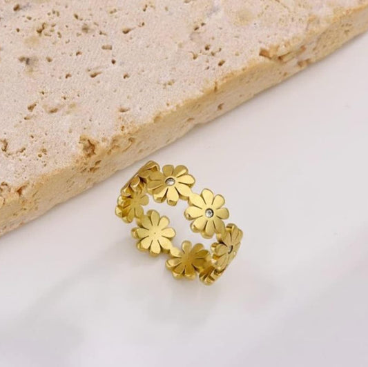: Gold floral waterproof ring with crystal center