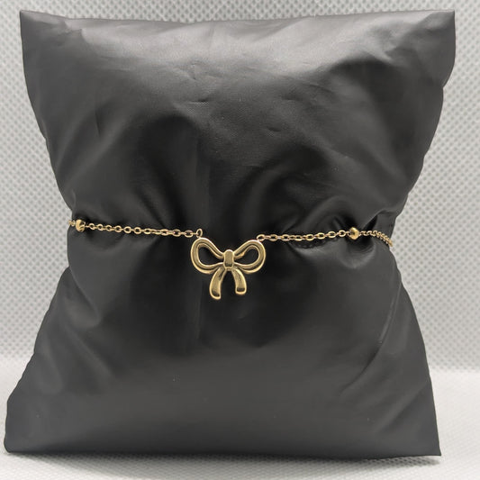 “Luxury gold bow bracelet – hypoallergenic and adjustable jewelry”