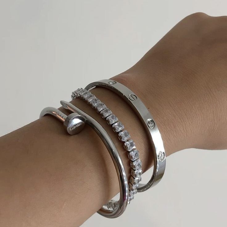 “Silver stainless steel bracelet trio – sparkle and shine luxury wrist jewelry”