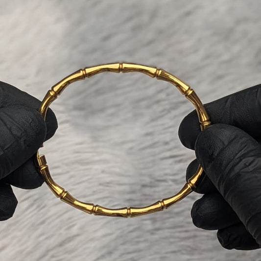 Elegant bamboo inspired gold bracelet