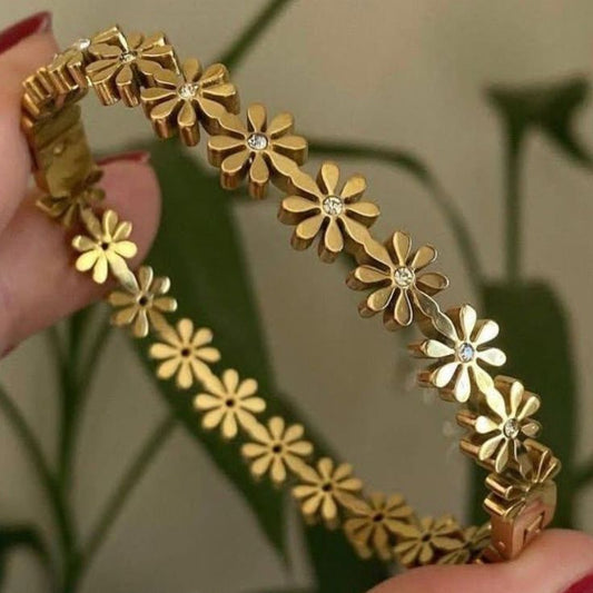 Gold floral bracelet with crystal centers, waterproof stainless steel jewelry, elegant flower design bracelet