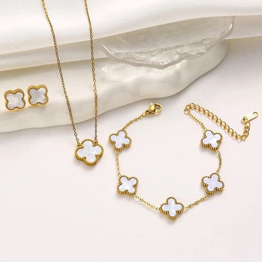 A luxurious 3-piece clover jewelry set featuring a mother-of-pearl clover necklace, matching bracelet, and stud earrings in gold-plated frames; waterproof and anti-tarnish premium jewelry.