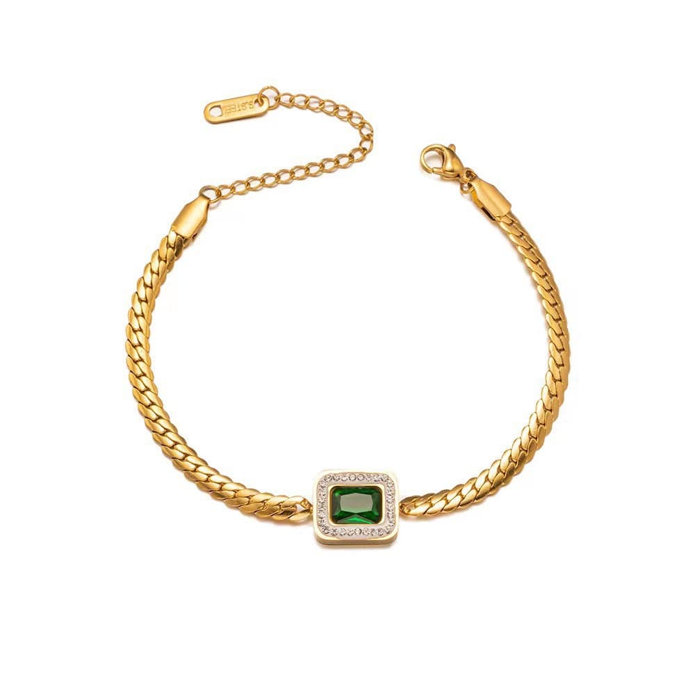 Gold-plated bracelet featuring a green gemstone with surrounding sparkling stones