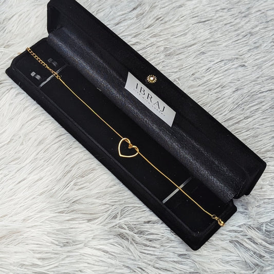 Shop the Ibraj Heart Bracelet featuring a minimal gold-tone heart charm and elegant chain design. Perfect for daily wear or gifting. Flat 70% OFF – limited stock.