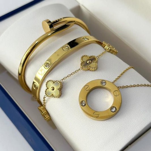 Gold-plated bracelet and necklace set with sparkling stones and floral design