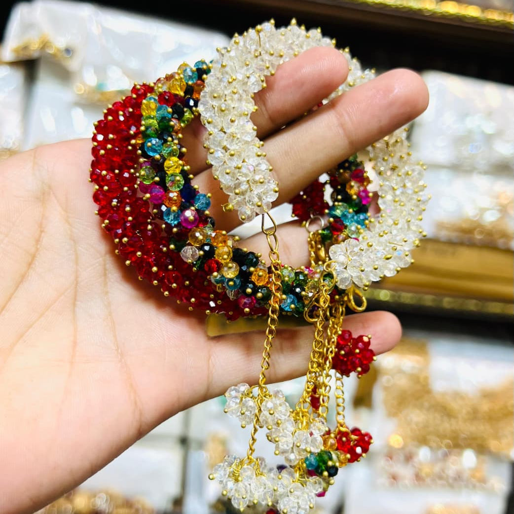 Traditional multicolour beaded bracelet set with dangling charms