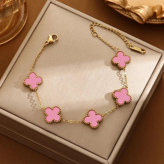 Premium gold bracelet with pink clover design