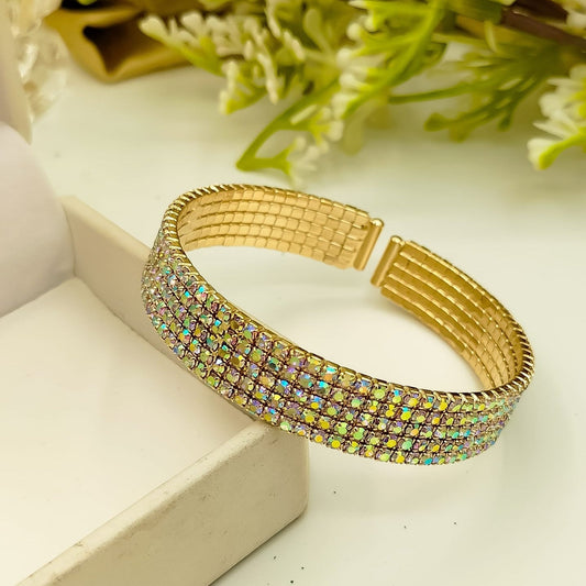 “Elegant gold bracelet with aurora shine stones – women’s luxury jewelry piece”