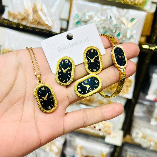 All pieces feature a black oval inlay with gold Roman numerals on a white satin background. Unique, vintage-style jewelry set.